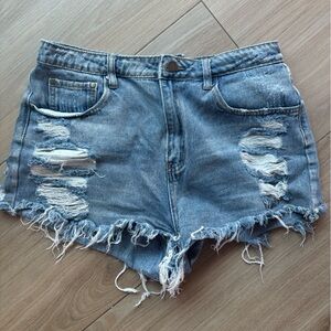 Cute distressed denim shorts! Size L